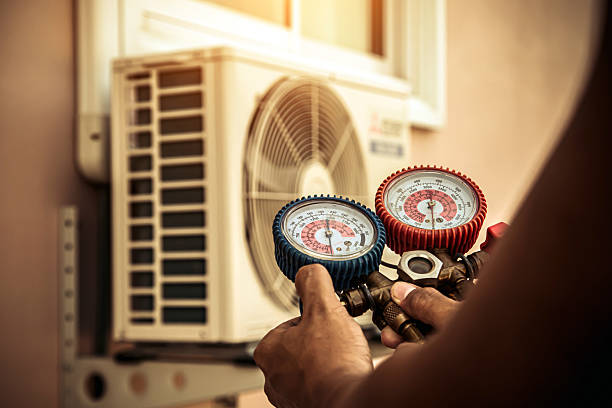 Professional Hvac Maintenance technician working in Van Buren, AR
